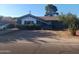Cozy single-story home featuring desert landscaping and a classic-style roof at 3830 W Cavalier Dr, Phoenix, AZ 85019