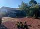Well-landscaped yard featuring decorative gravel and desert plants at 3830 W Cavalier Dr, Phoenix, AZ 85019