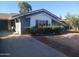 Charming single-story house with a well-maintained lawn and a welcoming entrance at 3830 W Cavalier Dr, Phoenix, AZ 85019