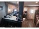 Bright kitchen with new countertops, wooden cabinets, and modern lighting at 3830 W Cavalier Dr, Phoenix, AZ 85019