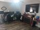 Contemporary living area featuring a fireplace and entertainment setup at 3830 W Cavalier Dr, Phoenix, AZ 85019