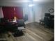 Comfortable living room with modern flooring and a practical layout at 3830 W Cavalier Dr, Phoenix, AZ 85019