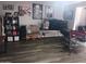 Spacious living room with hardwood floors and a variety of seating arrangements at 3830 W Cavalier Dr, Phoenix, AZ 85019