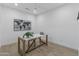 Bright and airy home office space with a modern desk and minimalist design at 3890 E Andalusia Ave, Gilbert, AZ 85298