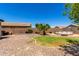 Spacious backyard featuring desert landscaping, an above ground pool, and privacy fencing at 40316 W Hopper Dr, Maricopa, AZ 85138