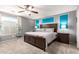 Tranquil main bedroom features large bed, soft lighting, and modern decor with cozy ambiance at 40316 W Hopper Dr, Maricopa, AZ 85138