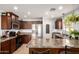 Beautiful kitchen with stainless steel appliances, granite countertops, and ample cabinet space at 40316 W Hopper Dr, Maricopa, AZ 85138