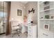 Cozy home office featuring a desk, chair, and built-in shelving for a productive workspace at 4067 W Maggie Dr, San Tan Valley, AZ 85144