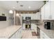 Modern kitchen featuring stainless steel appliances, granite countertops, and ample cabinet space at 4067 W Maggie Dr, San Tan Valley, AZ 85144