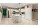 Bright, open kitchen with stainless steel appliances, a granite island, and a convenient pantry at 4067 W Maggie Dr, San Tan Valley, AZ 85144