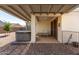 Covered patio with hot tub and seating area, great for outdoor relaxation at 4067 W Maggie Dr, San Tan Valley, AZ 85144