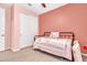 Bedroom with a ceiling fan and a closet at 4455 W Suncup Dr, San Tan Valley, AZ 85144