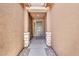 Welcoming entryway featuring a covered porch and a stylish front door at 4455 W Suncup Dr, San Tan Valley, AZ 85144