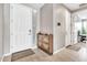 Bright foyer features a white front door, and tile flooring at 4455 W Suncup Dr, San Tan Valley, AZ 85144
