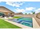 Backyard with a sparkling pool and spa, perfect for entertaining at 4455 W Suncup Dr, San Tan Valley, AZ 85144