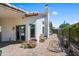 Charming back patio with brick flooring, an outdoor grill, and a cozy bench for relaxing evenings at 4507 E Duane Ln, Cave Creek, AZ 85331