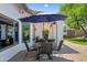 Inviting outdoor patio with dining area and serene view of the lush backyard, perfect for entertaining at 4507 E Duane Ln, Cave Creek, AZ 85331