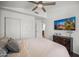Well-lit bedroom features a sliding closet and dark wood furniture, perfect for rest and relaxation at 4507 E Duane Ln, Cave Creek, AZ 85331