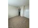 The bedroom has a large closet and tile flooring at 4625 W Thomas Rd # 48, Phoenix, AZ 85031