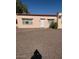Charming single-story home with a well-maintained yard and a desert landscape at 4625 W Thomas Rd # 48, Phoenix, AZ 85031