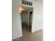 Hallway view features a storage and closet with neutral decor at 4625 W Thomas Rd # 48, Phoenix, AZ 85031