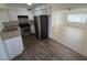 Clean kitchen featuring updated appliances, granite countertops, and ample cabinet space at 4625 W Thomas Rd # 48, Phoenix, AZ 85031