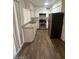 This kitchen has white cabinets and stainless steel appliances at 4625 W Thomas Rd # 48, Phoenix, AZ 85031