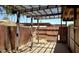 Covered patio area with wood pergola and partial fencing at 4625 W Thomas Rd # 48, Phoenix, AZ 85031