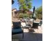 Inviting backyard with patio furniture and a swing set, offering a relaxing outdoor space at 4778 E Sourwood Dr, Gilbert, AZ 85298