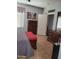 Bedroom featuring a padded bench, dresser and light-colored walls at 4778 E Sourwood Dr, Gilbert, AZ 85298
