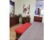 Bedroom features a mirror, red bench and view into the bathroom at 4778 E Sourwood Dr, Gilbert, AZ 85298