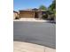 Charming single-story home with a tile roof, two-car garage, and well-maintained front yard at 4778 E Sourwood Dr, Gilbert, AZ 85298