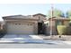 Charming single-Gathering home featuring a two-car garage, tile roof, and well-maintained landscaping at 4778 E Sourwood Dr, Gilbert, AZ 85298