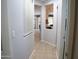 Bright hallway with tile flooring and neutral walls connecting various living spaces at 4778 E Sourwood Dr, Gilbert, AZ 85298