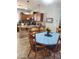 A cozy kitchen boasts wood cabinets, pendant lights, an island with bar seating, and an eat-in kitchen at 4778 E Sourwood Dr, Gilbert, AZ 85298