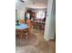 A cozy kitchen boasts wood cabinets, pendant lights, an island with bar seating, and an eat-in kitchen at 4778 E Sourwood Dr, Gilbert, AZ 85298