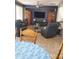 Inviting living room with comfortable seating, entertainment center and ceiling fan at 4778 E Sourwood Dr, Gilbert, AZ 85298