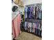 Spacious walk-in closet with organized shelving and hanging rods for ample storage at 4778 E Sourwood Dr, Gilbert, AZ 85298