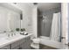 Modern bathroom featuring gray subway tile shower and gray cabinets with white countertops, providing a clean aesthetic at 5100 E Rancho Paloma Dr # 1044, Cave Creek, AZ 85331