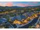Stunning two-story home featuring landscaped front yard and mountain views during sunset at 5100 E Rancho Paloma Dr # 1044, Cave Creek, AZ 85331