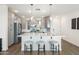 Bright kitchen with stainless steel appliances, white countertops, and modern pendant lighting at 5100 E Rancho Paloma Dr # 1044, Cave Creek, AZ 85331