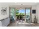 Bright living room features sliding doors leading to an outdoor patio with scenic views at 5100 E Rancho Paloma Dr # 1044, Cave Creek, AZ 85331