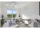 Bright home office with large window, a sleek desk, and minimalist decor at 5100 E Rancho Paloma Dr # 1044, Cave Creek, AZ 85331