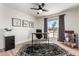 Bright office featuring a ceiling fan, natural light, and a workspace at 5211 E Winchcomb Dr, Scottsdale, AZ 85254