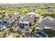 Aerial view of a backyard oasis with a pool, spa, covered patio, and desert landscaping at 5243 E Windstone Trl, Cave Creek, AZ 85331