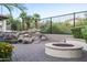 Beautiful backyard with patio, outdoor fire pit, pool with waterfall and privacy fence at 5243 E Windstone Trl, Cave Creek, AZ 85331
