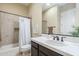 Bright bathroom with a tub and shower combination, complete with a single sink vanity and neutral tones at 5243 E Windstone Trl, Cave Creek, AZ 85331