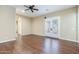 Bedroom features wood floors, bright natural light, neutral colored walls, and a ceiling fan at 5243 E Windstone Trl, Cave Creek, AZ 85331