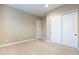 Bedroom with sliding door closets, and neutral walls with soft carpeting offer a blank canvas for personalization at 5243 E Windstone Trl, Cave Creek, AZ 85331
