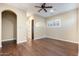 Bedroom features wood floors, bright natural light and neutral colored walls at 5243 E Windstone Trl, Cave Creek, AZ 85331